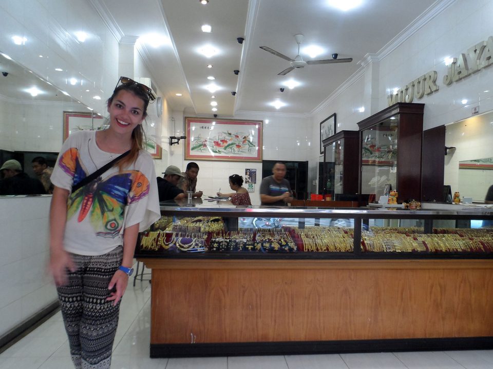 Dorie laughing in a gold store in Makassar in Sulawesi